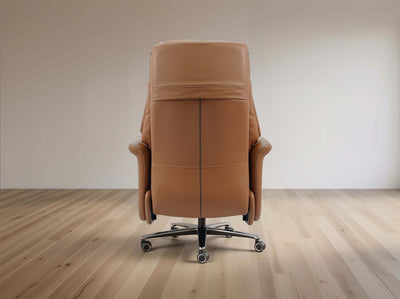 Brown leather recliner chair on a wooden floor with a plain wall background